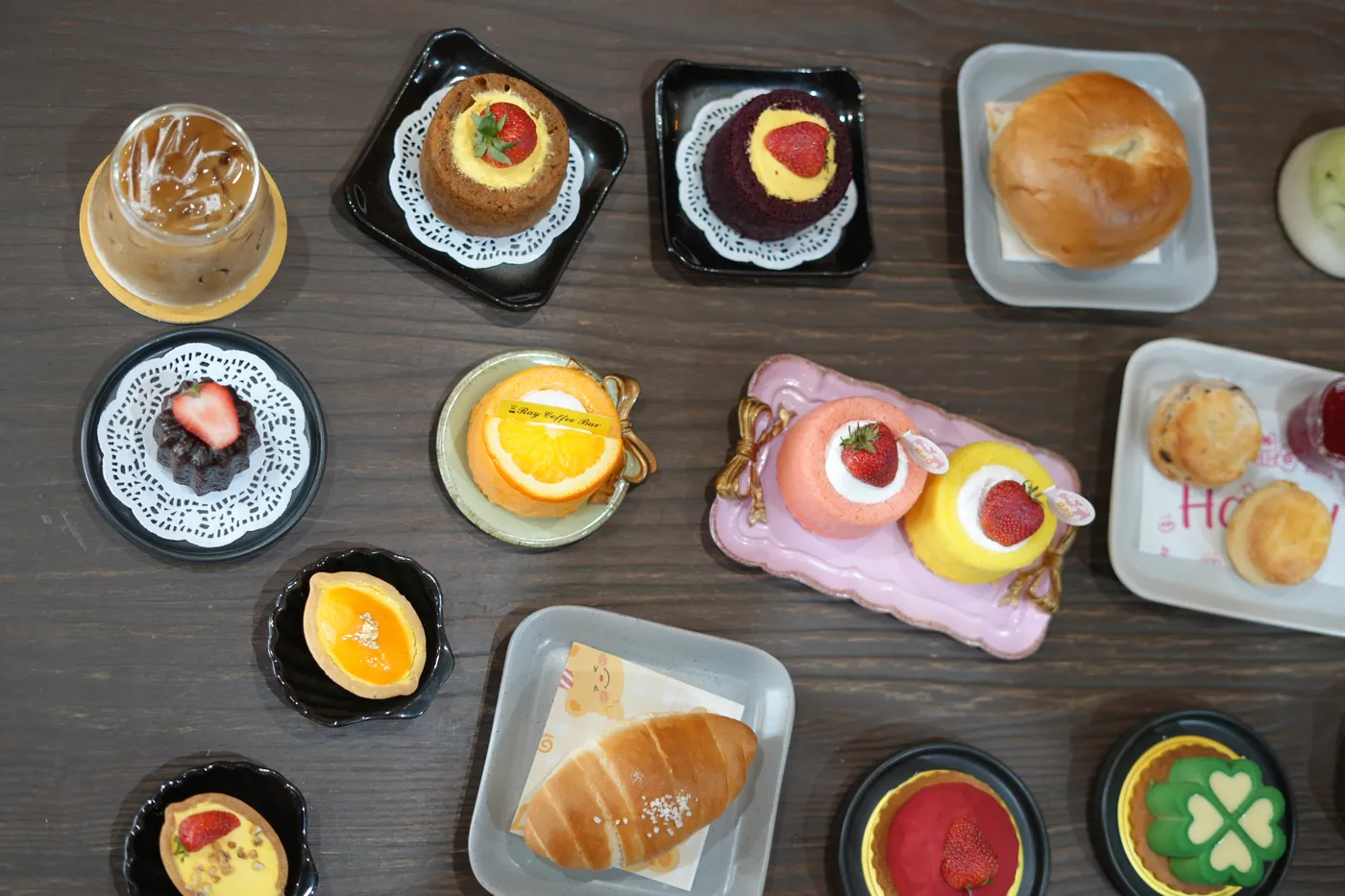 A table of the bakery's cakes, tarts and pastries.