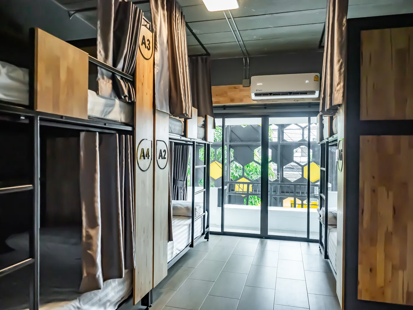 Room A from the door: bunks down both sides and the balcony at the end.