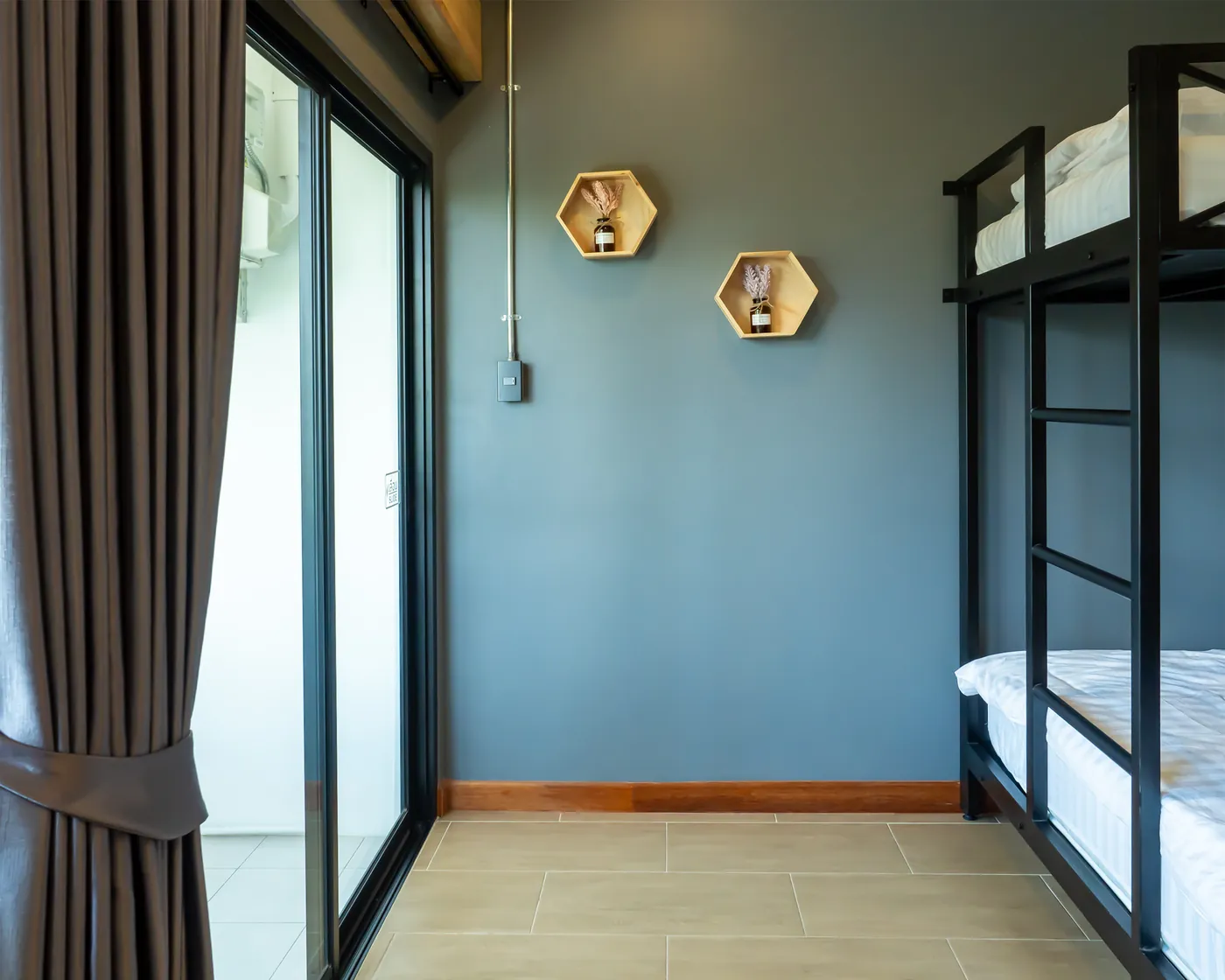 The family room's balcony door and hexagon shelves.